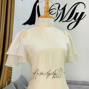 ÁO DÀI BƯNG QUẢ NỮ KEM CÁNH TIÊN