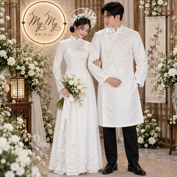 ÁO DÀI CƯỚI CẶP TRẮNG ĐÍNH KẾT LÔNG VŨ HẠT PHA LÊ