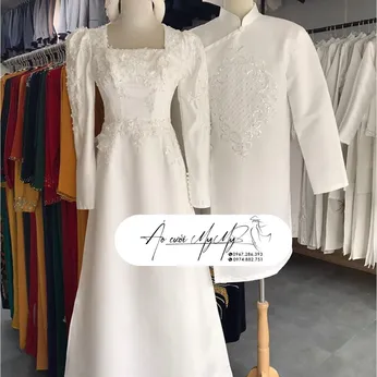 ÁO DÀI CẶP TRẮNG KẾT NƠ VÀ HẠT PHA LÊ