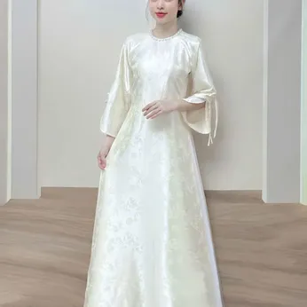 ÁO DÀI CÔ DÂU TRẮNG GẤM TRÚC ĐÀO