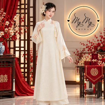 ÁO DÀI CÔ DÂU MÀU KEM HỌA TIẾT VÂN MÂY