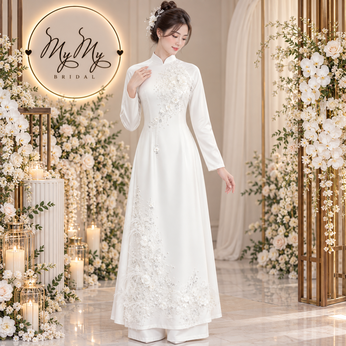 ÁO DÀI CÔ DÂU TRẮNG ĐÍNH KẾT HOA VÀ LÔNG VŨ