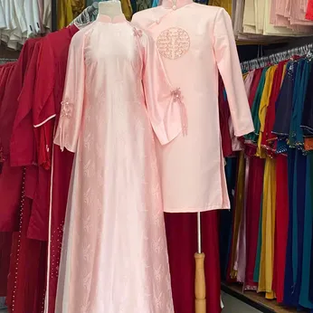 ÁO DÀI CƯỚI CẶP HỒNG KẾT HOA VÀ CHỮ HỶ