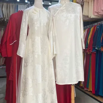 ÁO DÀI CƯỚI CẶP TRẮNG HỌA TIẾT HOA HỒNG