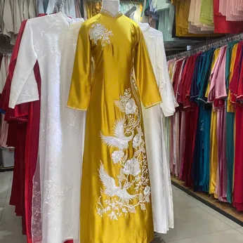 ÁO DÀI SUI VÀNG THÊU HOA HỒNG