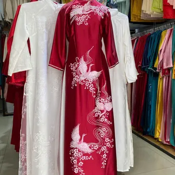 ÁO DÀI SUI HỒNG THÊU HẠC VÀ HOA MAI