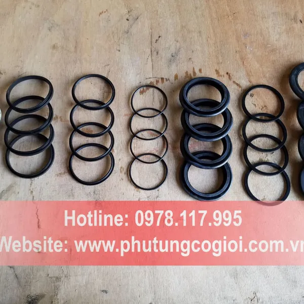 Bộ cúp pen thắng máy xúc lật