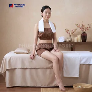BỘ QUẦN ÁO QUÂY SPA NÚT BẤM MÀU NÂU CÀ PHÊ