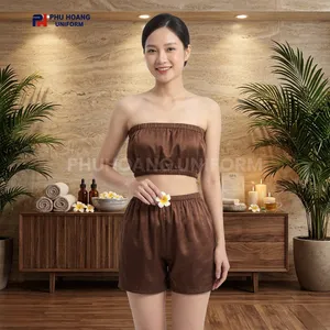 BỘ QUẦN ÁO QUÂY SPA NÚT BẤM MÀU NÂU