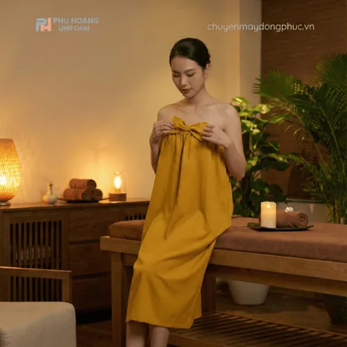 VÁY QUÂY SPA MÀU VÀNG CHO KHÁCH