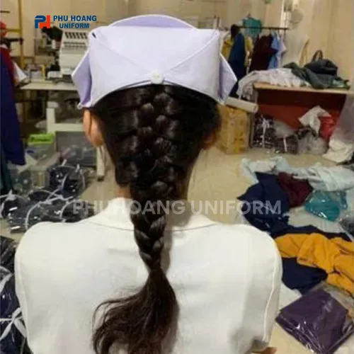 NÓN Y TÁ TRẮNG CÀI NÚT