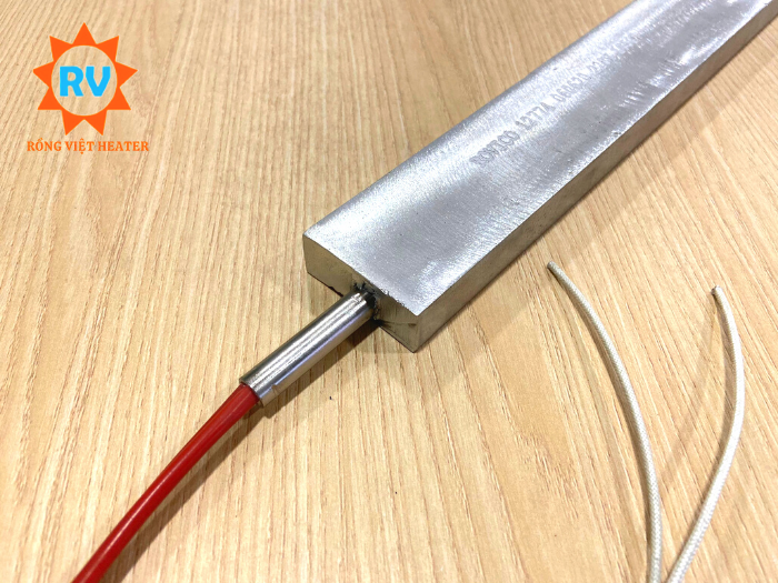 Điện trở đúc nhôm 1 đầu ra dây 540*52*20 220V 1050W Điện trở đúc nhôm 1 đầu ra dây 540*52*20 220V 1050W