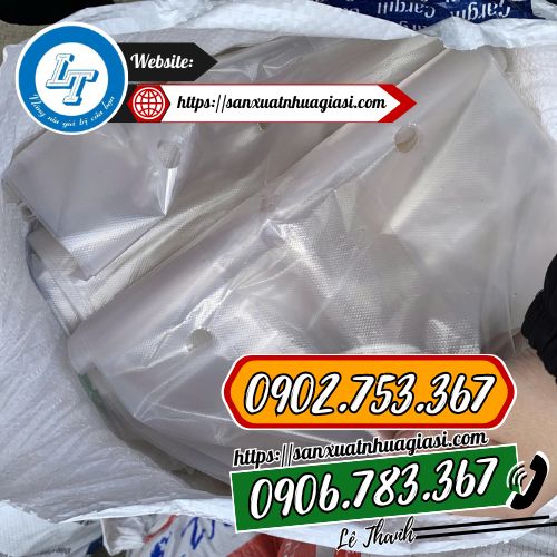 Đóng bao 25kg túi nilon đục lỗ Đóng bao 25kg túi nilon đục lỗ