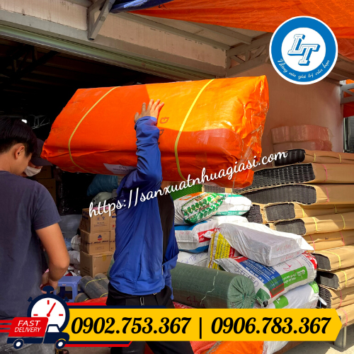 Giao cuộn bạt nhựa xanh cam Giao cuộn bạt nhựa xanh cam