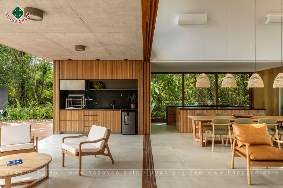 Phòng khách với trần cao thông tầng, cho phép nhìn lên bầu trời từ mọi vị trí Phòng khách với trần cao thông tầng, cho phép nhìn lên bầu trời từ mọi vị trí