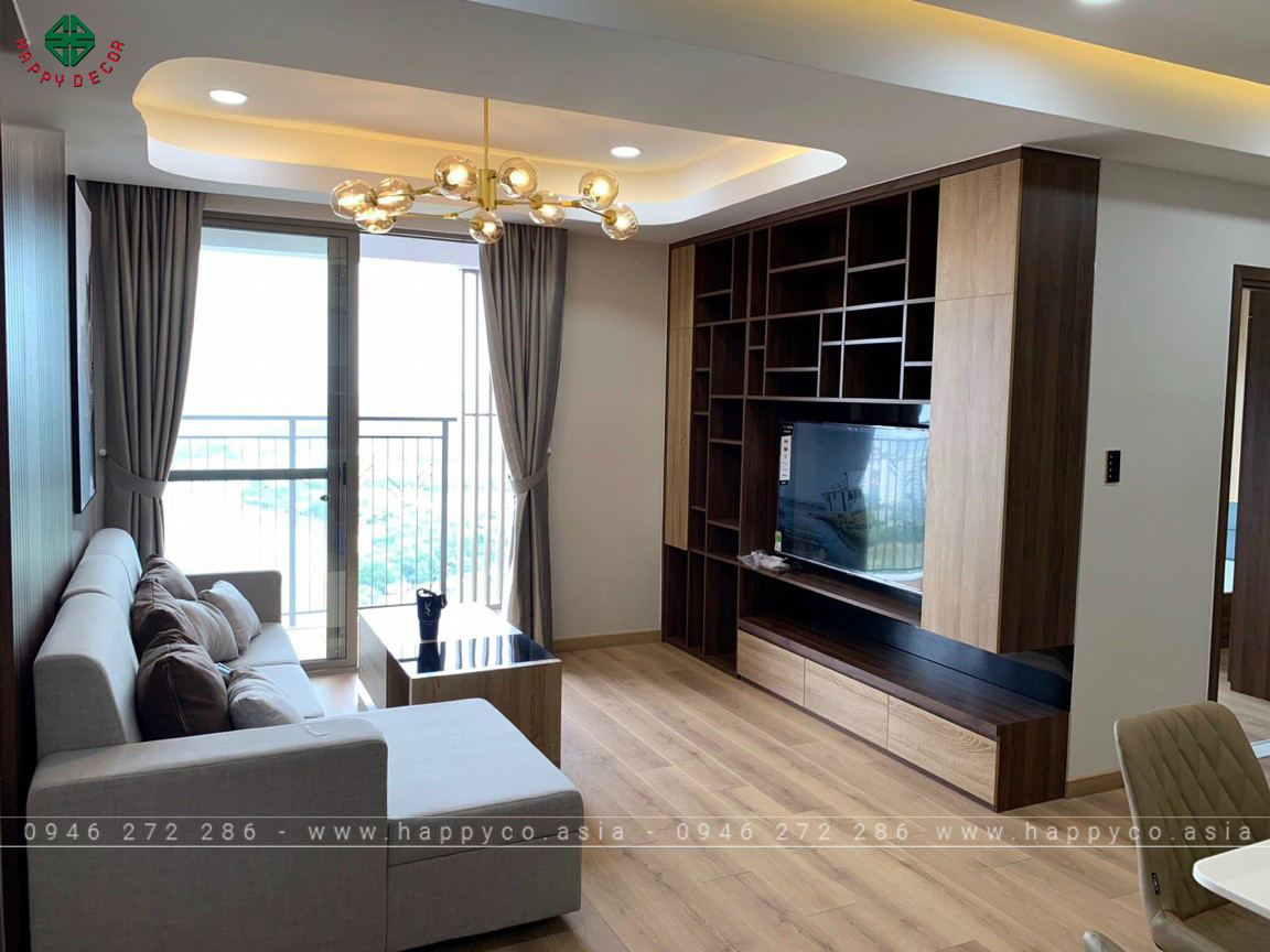 Kệ Tivi phòng khách được làm từng ván nhựa vân gỗ Pima