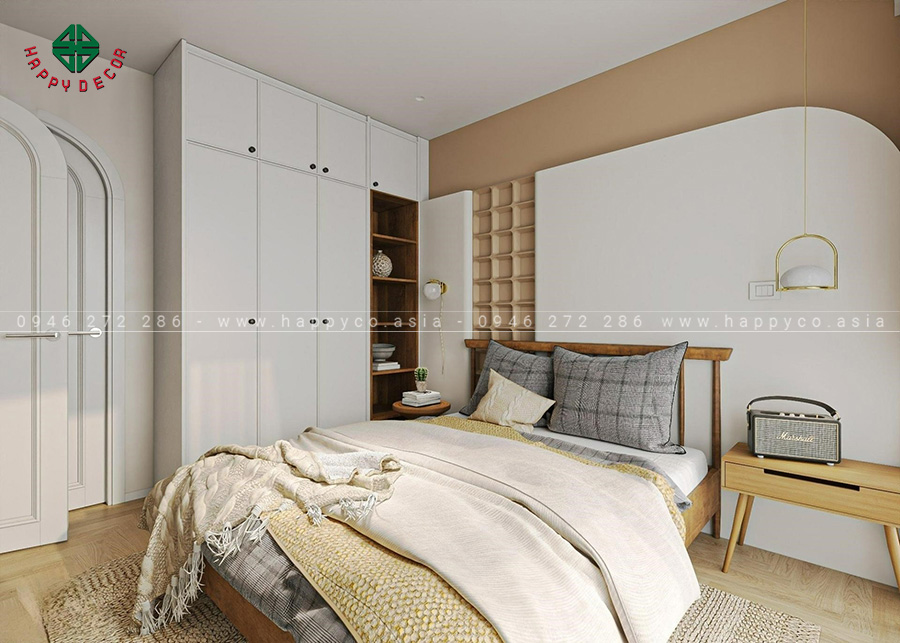 Không gian phòng ngủ là sự kết hợp rất hài hòa giữa màu cam và trắng