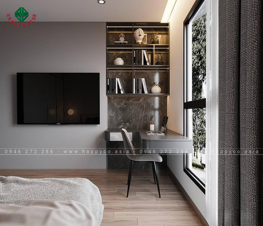 Bàn làm việc được đặt cạnh cửa sổ tận dụng ánh sáng tự nhiên giúp gia chủ làm việc hiệu quả