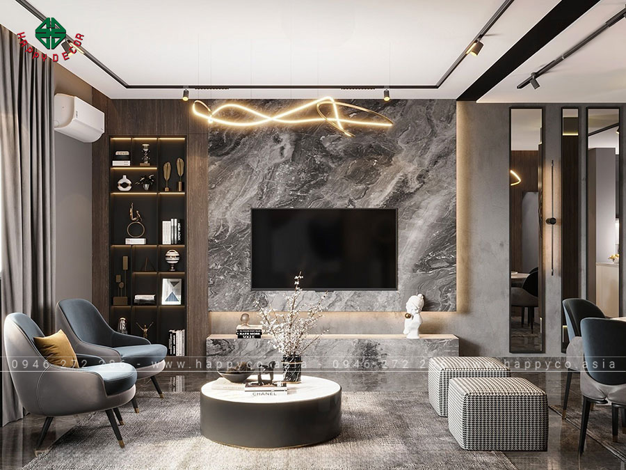 Khu vực tivi được trang trí bằng đá giả PVC, với ý tưởng thiết kế độc đáo