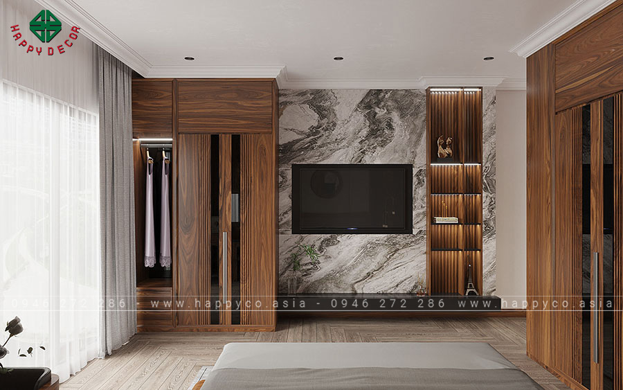 Khu vực tivi nổi bật với thiết kế vách PVC hoa văn nhân tạo kết hợp với hệ thống tủ tạo nên không gian ấn tượng