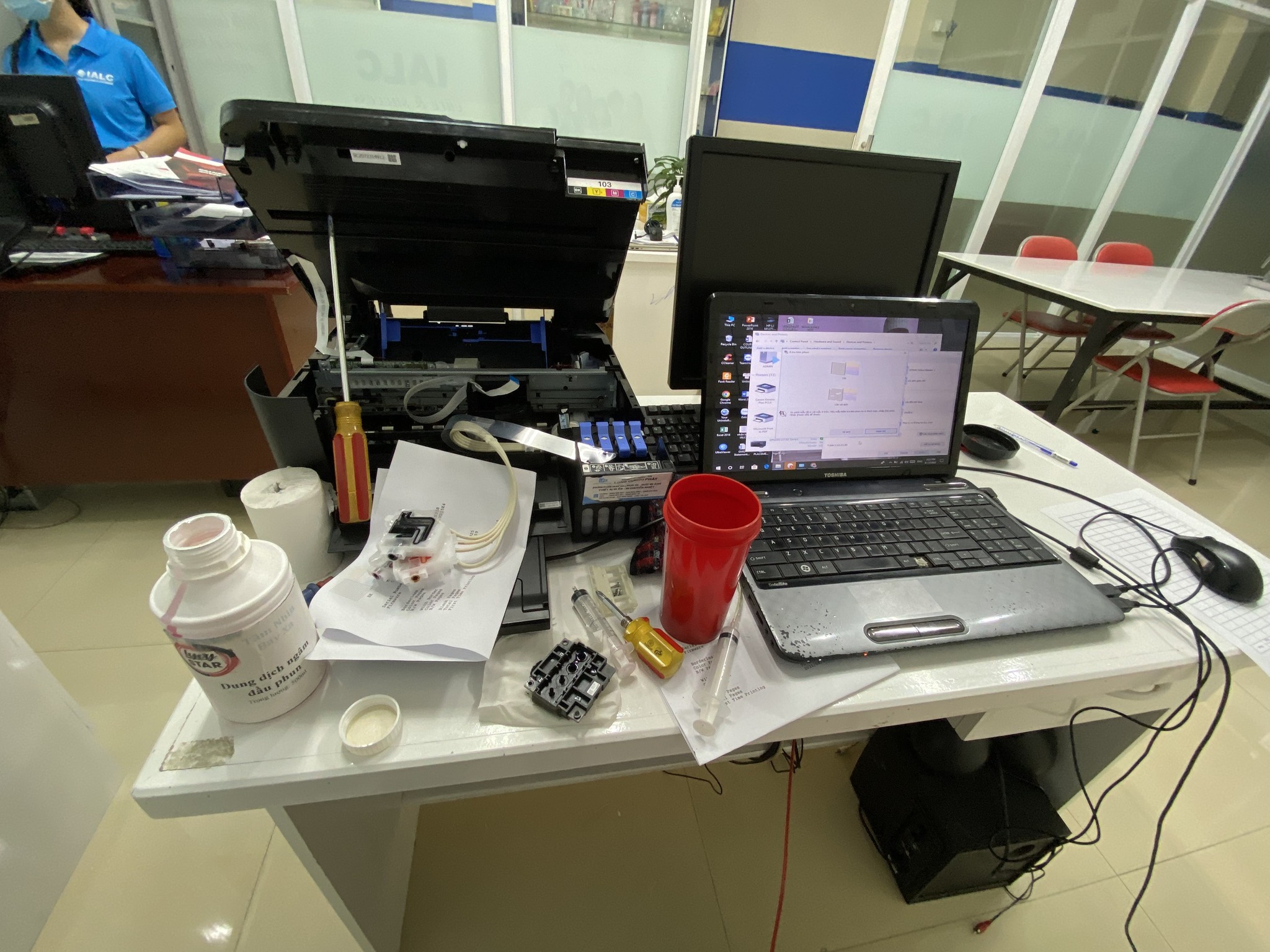 phục hồi đầu phun máy in Epson tại Long Thành Đồng Nai Sử dụng dung dịch làm sạch đầu phun chuyên dụng