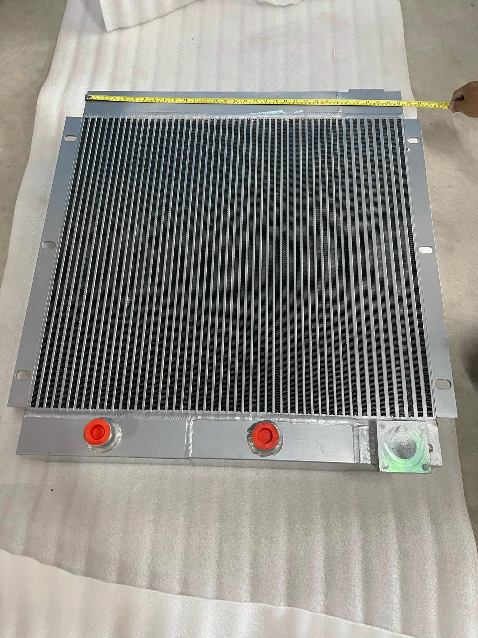 két giải nhiệt máy nén khí