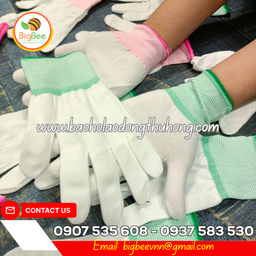 Găng tay thun không phủ PU màu trắng viền cổ tay Găng tay thun không phủ PU màu trắng viền cổ tay