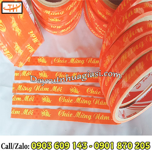 Băng keo in chữ chúc mừng năm mới dán miệng hộp Băng keo in chữ chúc mừng năm mới dán miệng hộp