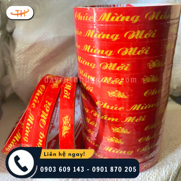 Băng keo đỏ chúc mừng năm mới với màu sắc nổi bật, in rõ nét Băng keo đỏ chúc mừng năm mới với màu sắc nổi bật, in rõ nét