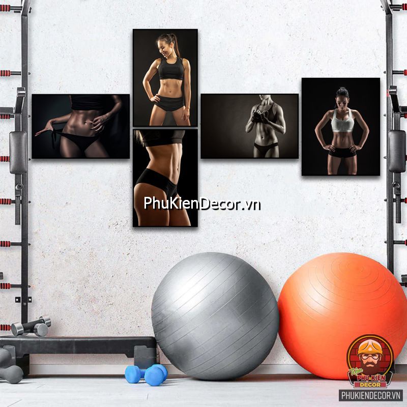 Sử dụng tranh treo tường phòng tập gym phổ biến tạo động lực cho người tập Sử dụng tranh treo tường phòng tập gym phổ biến tạo động lực cho người tập