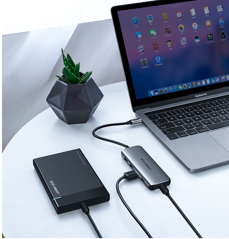 Bộ chia USB Type C ra 4 cổng USB 3.0 hỗ trợ cổng USB-C cấp nguồn Ugreen 50980 Bộ chia USB Type C ra 4 cổng USB 3.0 hỗ trợ cổng USB-C cấp nguồn Ugreen 50980