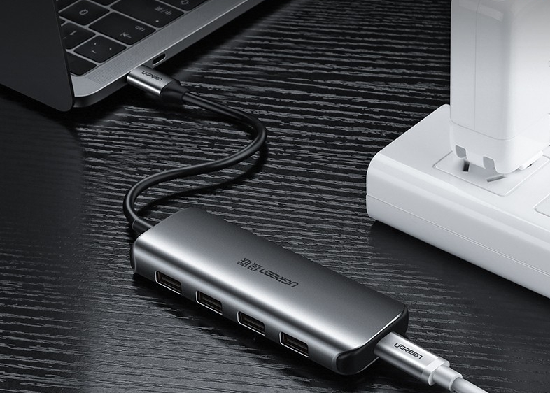 Bộ chia USB Type C ra 4 cổng USB 3.0 hỗ trợ cổng USB-C cấp nguồn Ugreen 50980 Bộ chia USB Type C ra 4 cổng USB 3.0 hỗ trợ cổng USB-C cấp nguồn Ugreen 50980