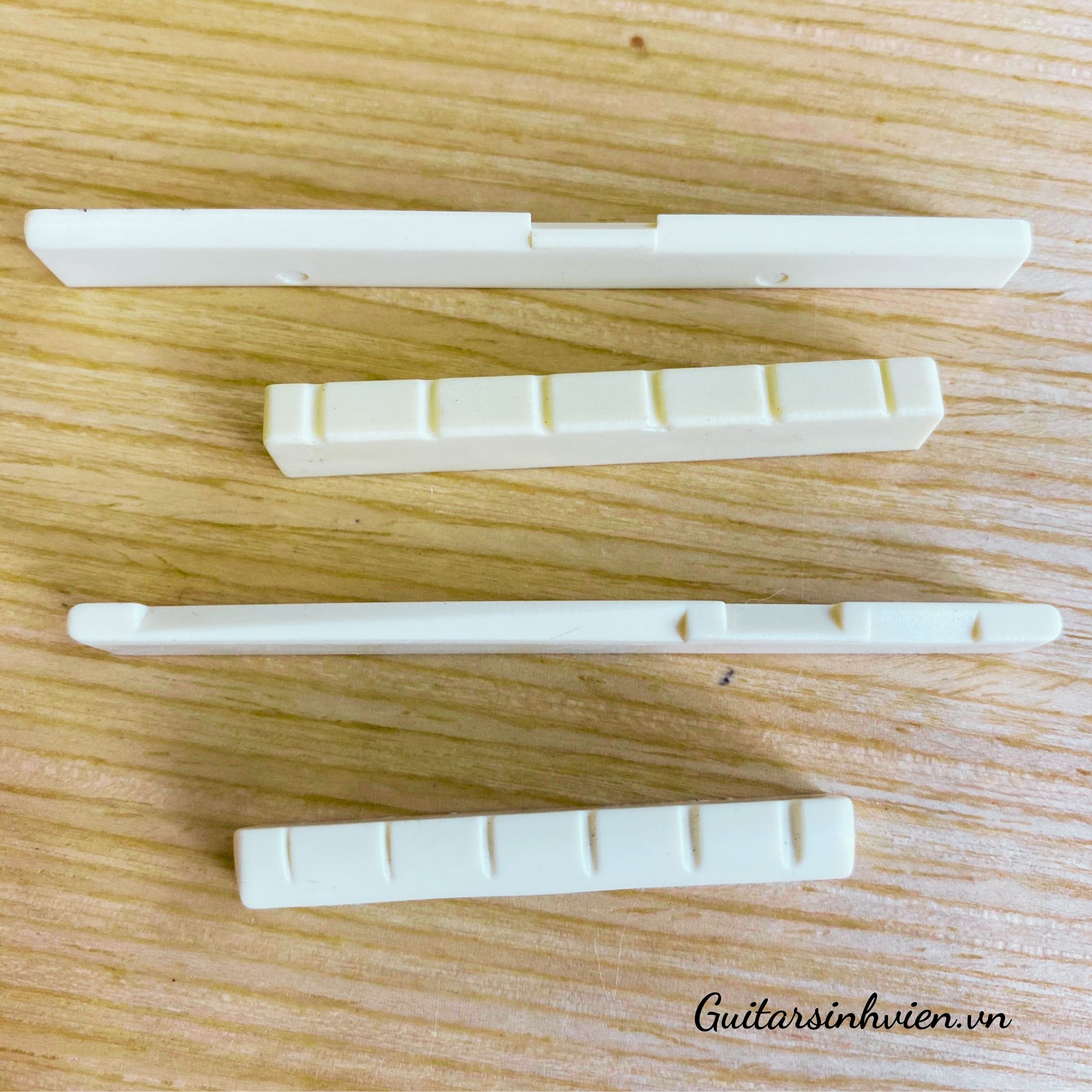 Ngựa lược nhựa cho đàn guitar Ngựa lược nhựa cho đàn guitar