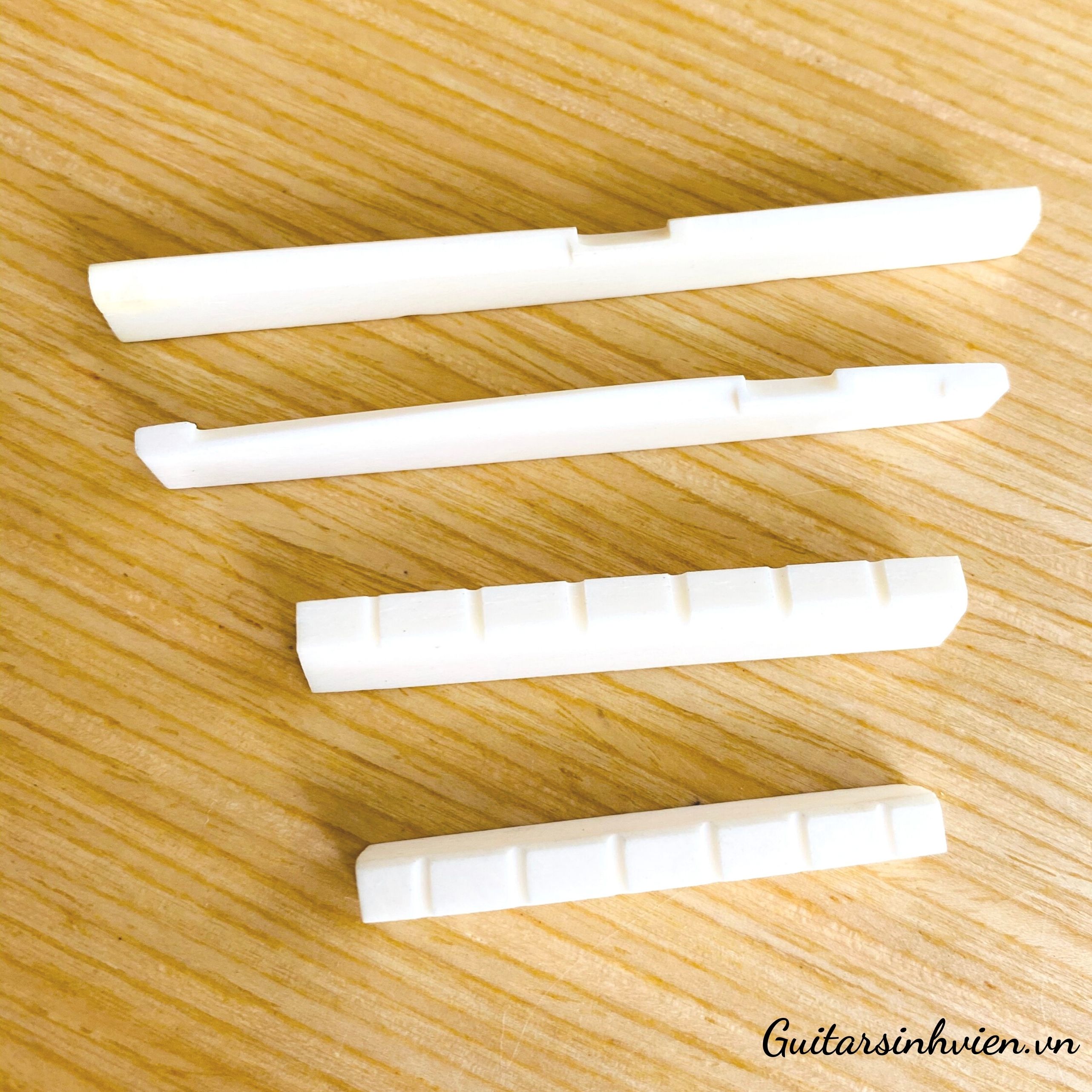 Ngựa lược xương bò mài sẵn cho guitar Ngựa lược xương bò mài sẵn cho guitar