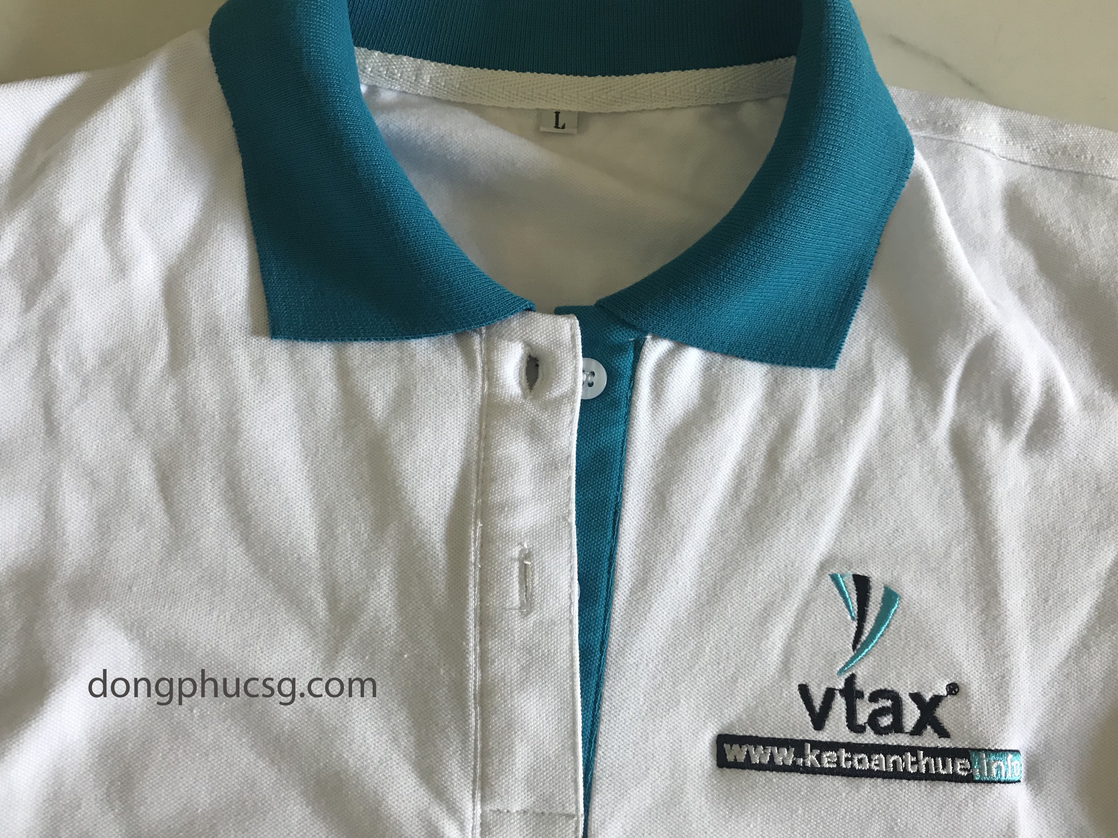 Hình ảnh đồng phục áo thun nhân viên công ty Vtax Hình ảnh đồng phục áo thun nhân viên công ty Vtax