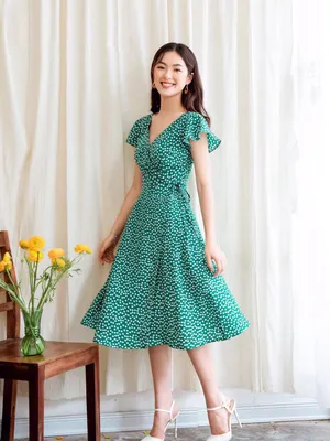 Đầm xoè hoa nhí màu xanh tay cánh tiên