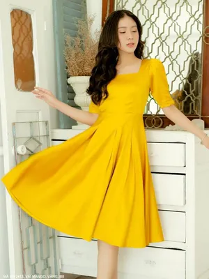 Đầm xòe màu vàng cổ vuông tay lửng sáng da