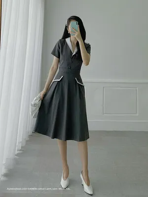 Đầm xoè cổ vest đính nút tay con