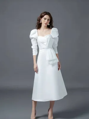 Đầm xòe trắng tay phồng dài cúp ngực phối nơ