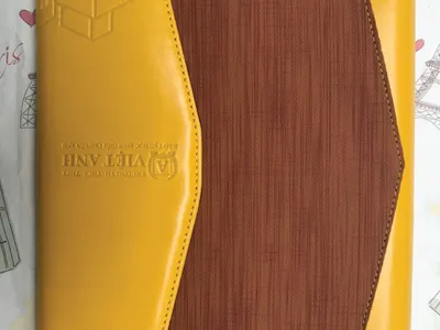 Nơi may bìa sổ da