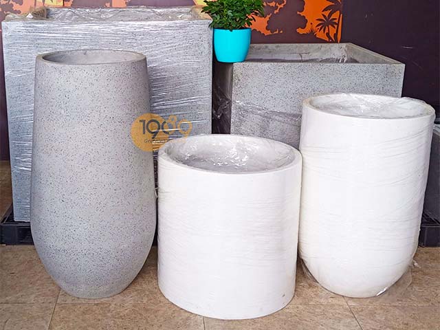 chậu xi măng đá mài tròn lớn 1m hình giọt nước