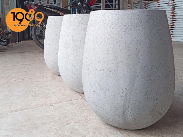 chậu xi măng đá mài tròn Oval hcm