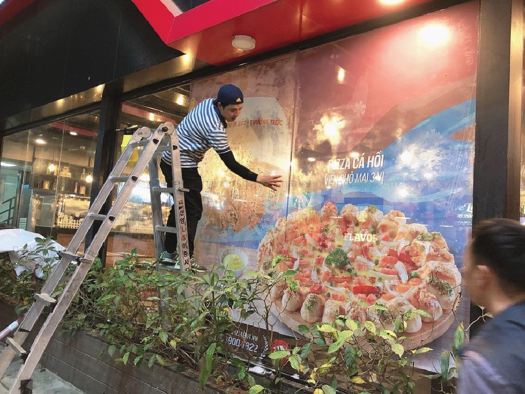 in decal lưới dán lên kính  in decal lưới dán lên kính