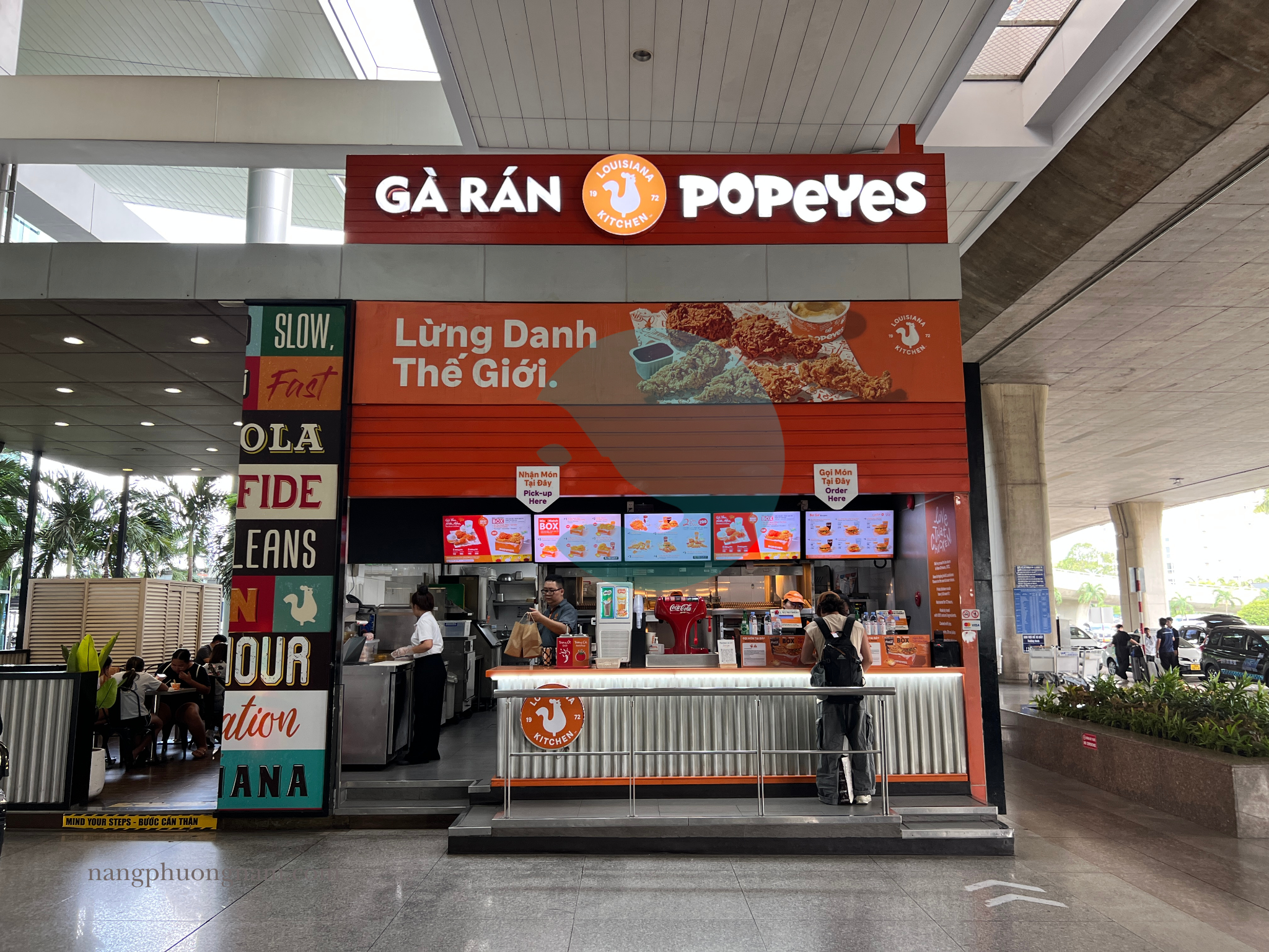 bien quang cao ga ran popeyes