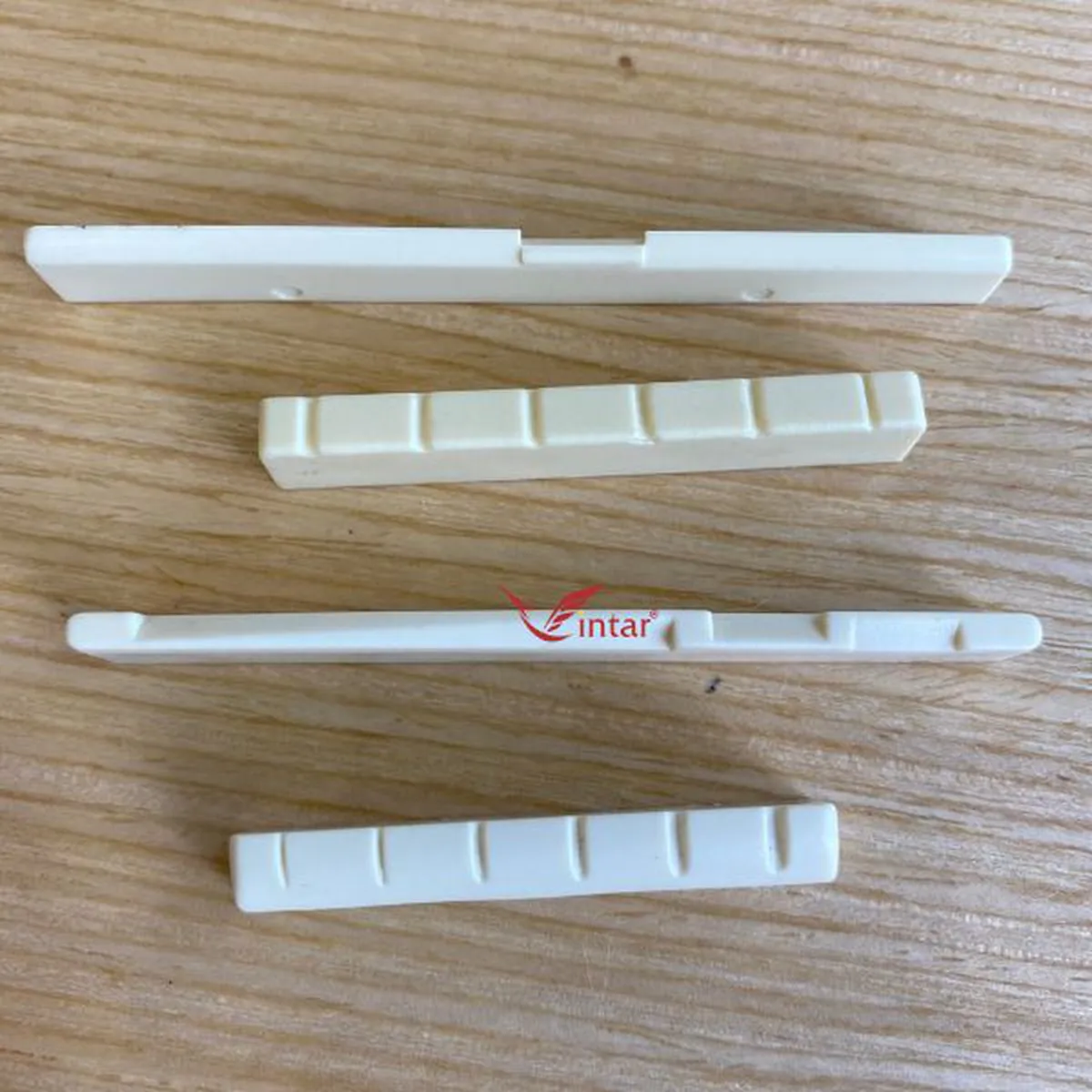 Ngựa Lược Nhựa Đàn Guitar