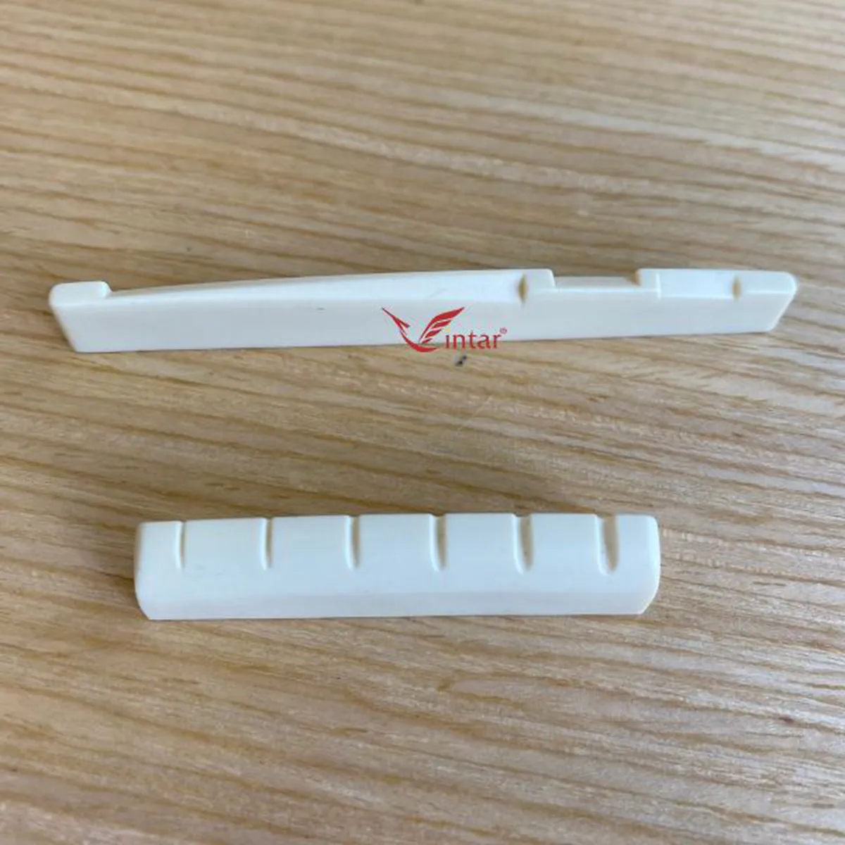 Ngựa Lược Nhựa Đàn Guitar