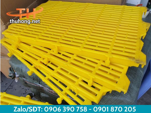 Sàn nhựa chăn nuôi heo màu vàng 40x60 Sàn nhựa chăn nuôi heo màu vàng 40x60