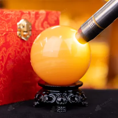 Quả Cầu Đá Phong Thủy Hoàng Long (Onyx) Vàng - 0,7kg - M183607