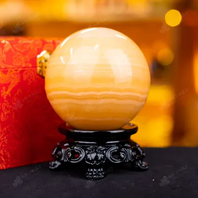 Quả Cầu Đá Phong Thủy Hoàng Long (Onyx) Vàng - 1,42kg - M18361421