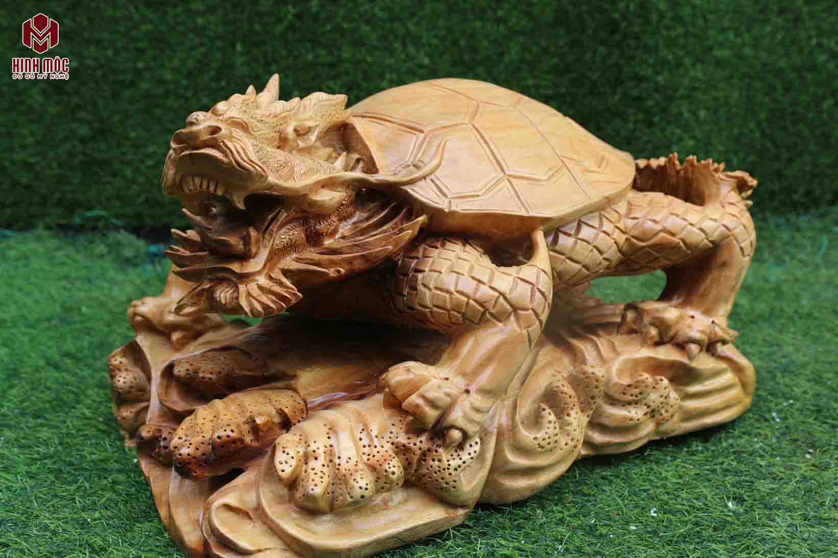 Cụ long quy dài 50cm, cao 31, rộng 35cm, gỗ xá xị. Giá 4,5 triệu đồng